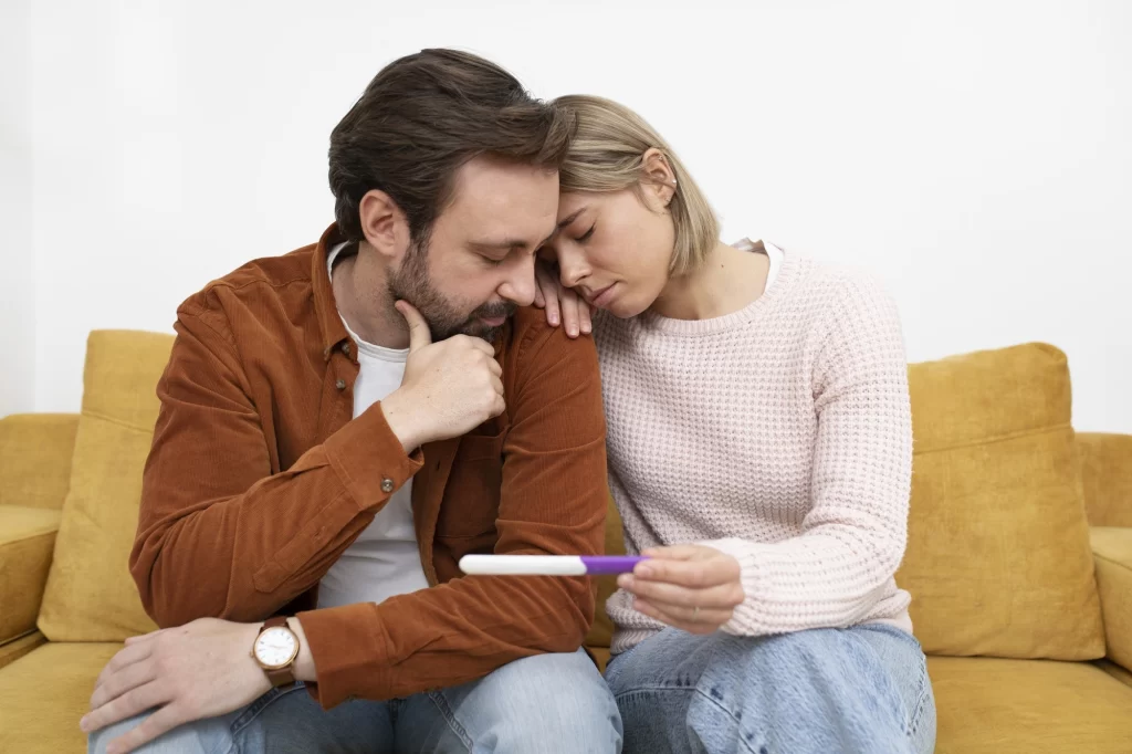 medium-shot-sad-couple-infertility-concept (1)